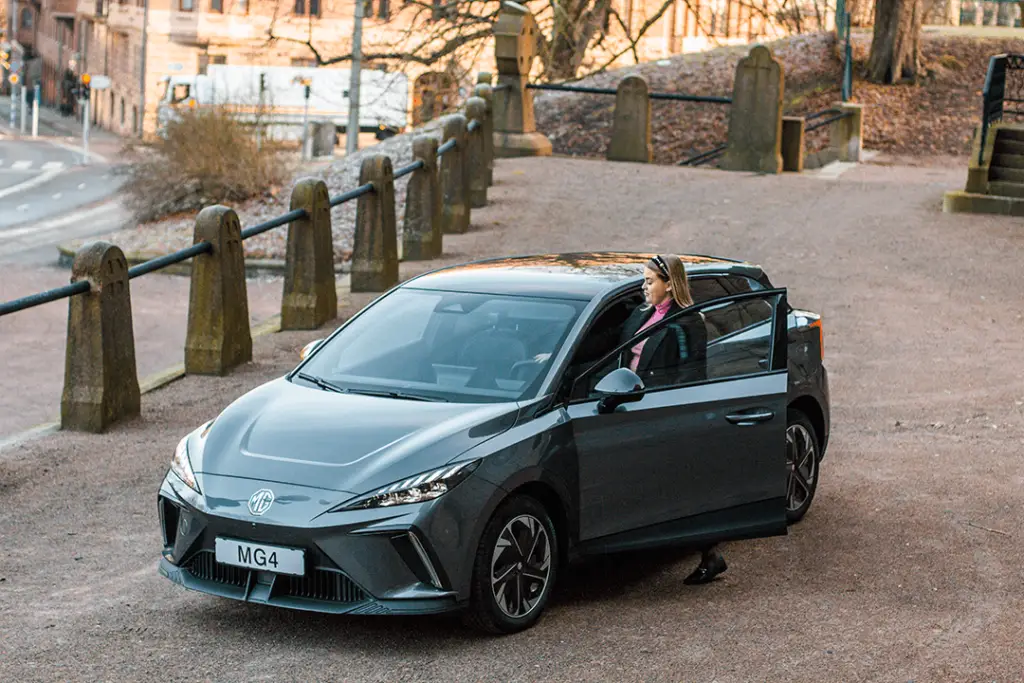 MG4-woman-gets-in-a-car